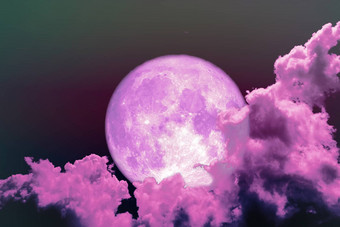 超级完整的粉红色的月亮回来轮廓晚上品红色的天空