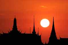 日落回来轮廓佛教寺庙红色的橙色晚上克罗