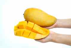 手黄色的芒果芒果片多维数据集孤立的白色