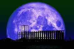 超级狼月亮回来轮廓建设晚上天空