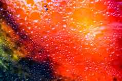 色彩斑斓的光影子红色的橙色黄色的石油模糊表面