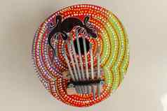 传统的音乐的仪器karimba壁虎蜥蜴主题关闭卡林巴使椰子壳牌细节拇指计划卡林巴安比拉琴银尖上