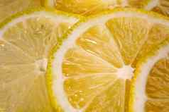 柠檬背景关闭视图柠檬片柑橘类纹理
