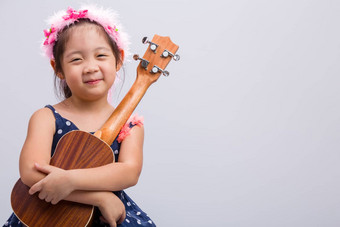 孩子尤克里里琴孩子尤克里里琴背景