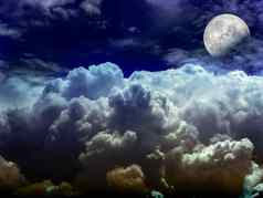 一半月亮堆白色云晚上天空