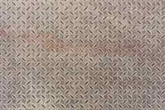 灰色的尘土飞扬的平重金属表地板上纹理钻石检查程序胎面打滑证明模式背景纹理