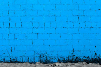 蓝色的石膏粗糙的砖墙纹理