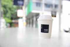 卡布奇诺咖啡咖啡咖啡纸杯白色语气咖啡店