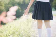 肖像亚洲日本学校女孩服装公园