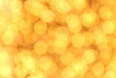 散景背景黄金黄色的色彩斑斓的快乐圣诞节快乐一年散景照明发光晚上背景散景闪闪发光的光金奢侈品背景纹理闪闪发光的壁纸