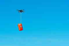 multicopter无人机飞行援助工具包孤立的蓝色的