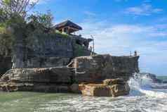 美丽的巴厘岛的景观古老的印度教寺庙土地很多岩石日落天空巴厘岛岛印尼著名的土地很多寺庙海巴厘岛岛印尼蓝色的天空波