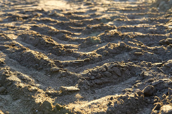 挖掘机<strong>跟踪</strong>地面纹理泥地面地球土壤<strong>跟踪跟踪</strong>标志着标记干表面纹理
