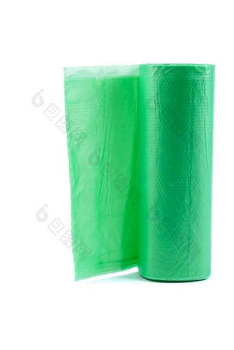 卷绿色塑料垃圾袋卷绿色塑料垃圾袋孤立的白色背景