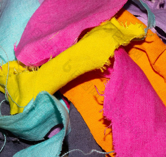 残羹剩饭色彩鲜艳的织物纺织品背景