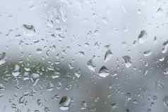 雨水下降玻璃窗口雨冷凝多雨的风暴季节