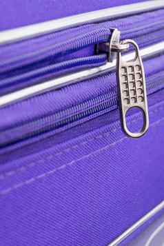 拉选项卡链拉链紫罗兰色的手提箱