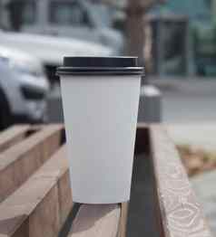 白色纸咖啡杯黑色的塑料成员咖啡广告