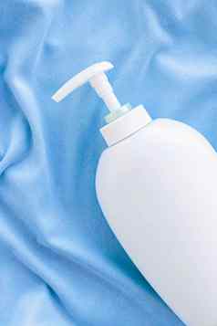空白标签瓶抗菌液体肥皂手洗手液模型蓝色的丝绸卫生产品健康护理