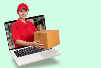 亚洲交付女人红色的衬衫模糊仓库背景持有货物订单包包裹移动PC电脑孤立的复制空间订单在线交付服务概念