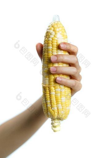 成熟的玉米<strong>避孕套</strong>手白色背景孤立的