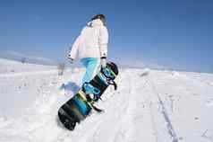 女孩滑雪滑雪板白色雪