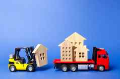 黄色的叉车加载房子数据红色的卡车概念运输货物航运移动公司建设房子对象行业移动整个建筑