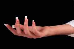 人类手指长指甲美丽的修指甲孤立的黑色的