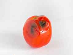腐烂的西红柿红色的水果酸甜蜜的皮肤黑色的模具白色背景