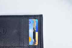 借记信贷卡片黑色的颜色钱包白色背景前视图