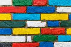 色彩斑斓的砖墙背景彩虹色彩鲜艳的砖墙
