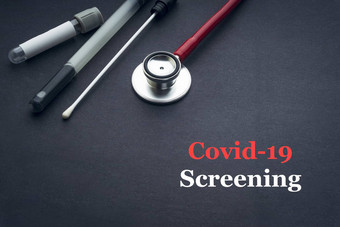 科维德冠状病毒筛选文本听诊器医疗拭子血样本管黑色的背景