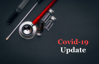 科维德冠状病毒更新文本听诊器医疗拭子瓶黑色的背景