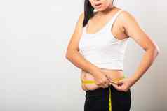 女人部分产后疤痕测量腰拉伸马克