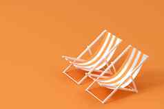 遮阳伞海滩椅子橙色背景呈现