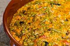 关闭色彩斑斓的新鲜的素食者西班牙海鲜饭西班牙语大米