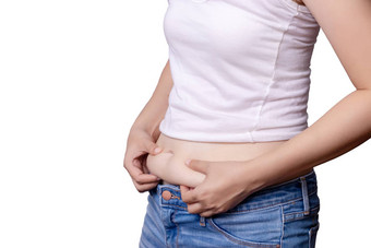 亚洲女人身体脂肪肚子一边视图手挤压多余的脂肪隔离白色背景剪裁路径包括