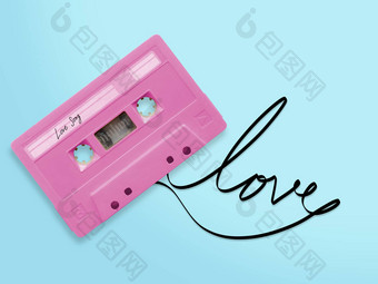 粉红色的音频盒式磁带磁带标签标签爱首歌纠结的磁带丝带词爱孤立的蓝色的背景前视图