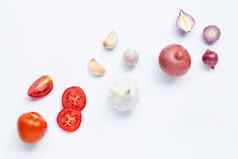 新鲜的蔬菜白色背景番茄红色的洋葱大蒜