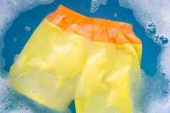 黄色的橙色婴儿短裤浸泡婴儿洗衣洗涤剂什么