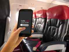 飞行安全概念乘客转可移植的电子设备移动电话飞行模式飞机上飞机飞行服务