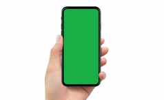 左手持有白色移动智能手机设备绿色屏幕