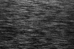 黑色的金属纹理白色划痕摘要噪音黑色的背景覆盖设计