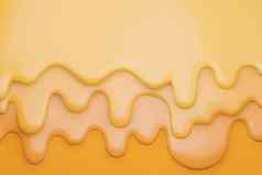奶酪奶油液体滴奶酪融化黄色的背景模型插图