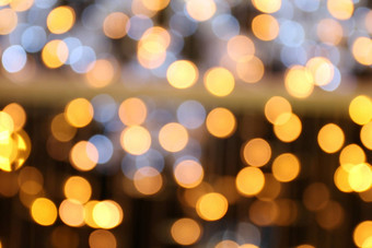 软散景黄金黄色的背景散景黄金黄色的色彩斑斓的快乐圣诞节快乐一年散景照明发光晚上散景闪闪发光的光金奢侈品背景闪闪发光的壁纸