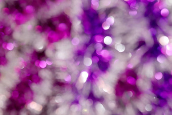 模糊图片紫色的粉红色的散景色彩斑斓的闪闪发光的快乐圣诞节快乐一年节日背景设计
