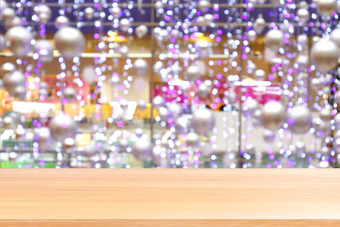 木板材散景紫色的照明生动的色彩斑斓的摘要背景空木表格地板照明装饰购物购物中心木表格董事会空前面紫罗兰色的散景闪闪发光的室内光