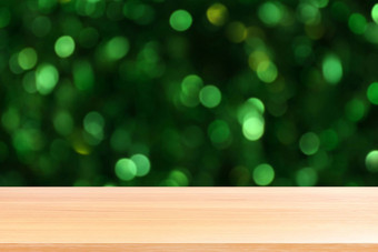 木板材照明美丽的闪闪发光的绿色散景背景空木表格地板阳光照明绿色自然森林散景木表格董事会空前面绿色闪闪发光的背景光