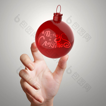 手显示快乐圣诞节点缀球