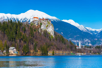 湖流血斯洛文尼亚中世纪的城堡岩石<strong>雪山蓝色</strong>的<strong>天空</strong>背景